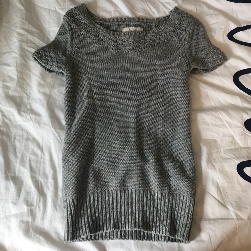 Grey knit sweater.